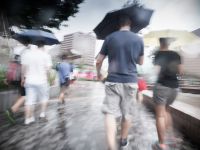 People under umbrella People under umbrella